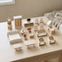 Hicooo solid wood dollhouse furniture set in natural wood, arranged on a table for Scandinavian pretend play.