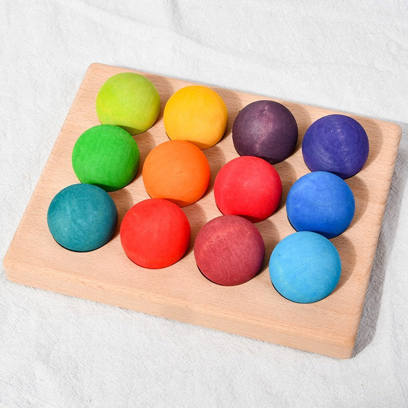 12-Piece Wooden Rainbow Balls in a Tray for Open-Ended Play