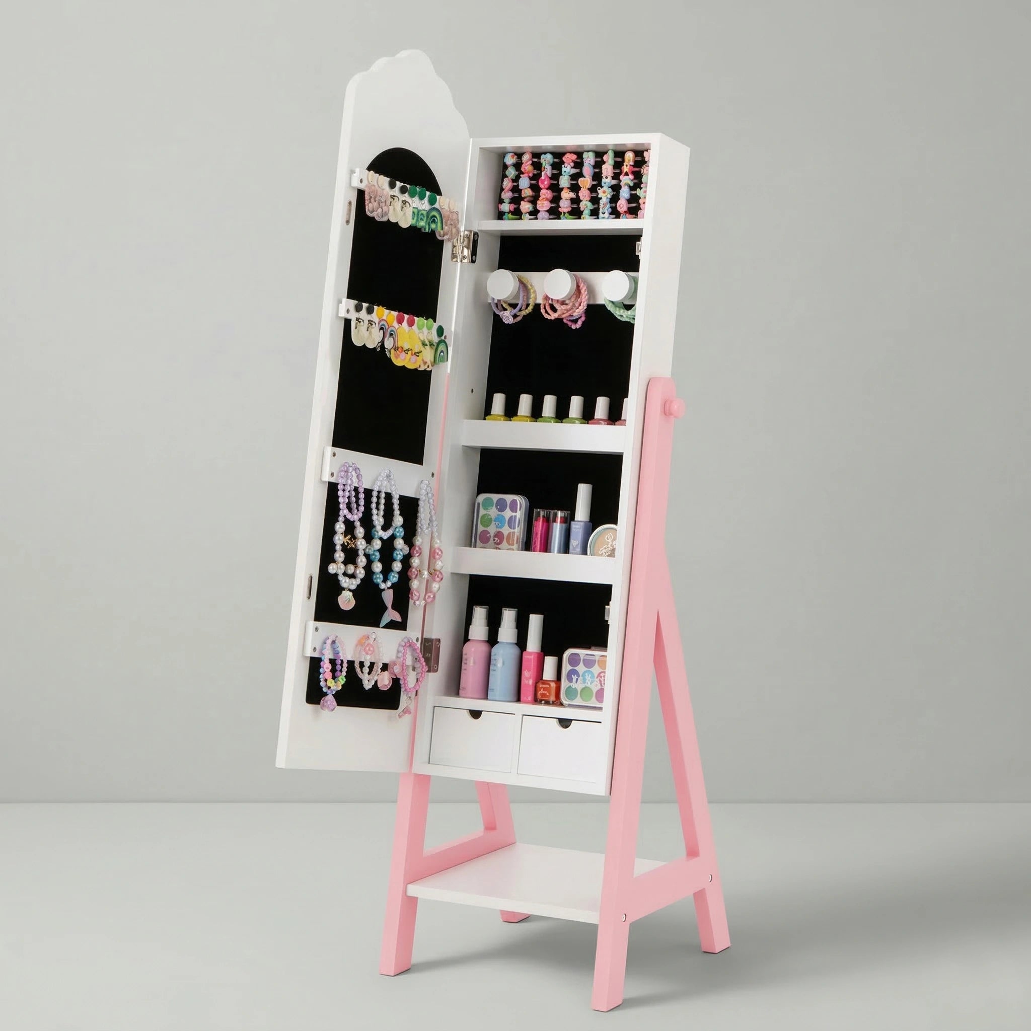 An open Hicooo pink and white kids jewelry cabinet showing a black velvet interior with neatly organized earrings, bracelets, necklaces, makeup shelves, and two small drawers.