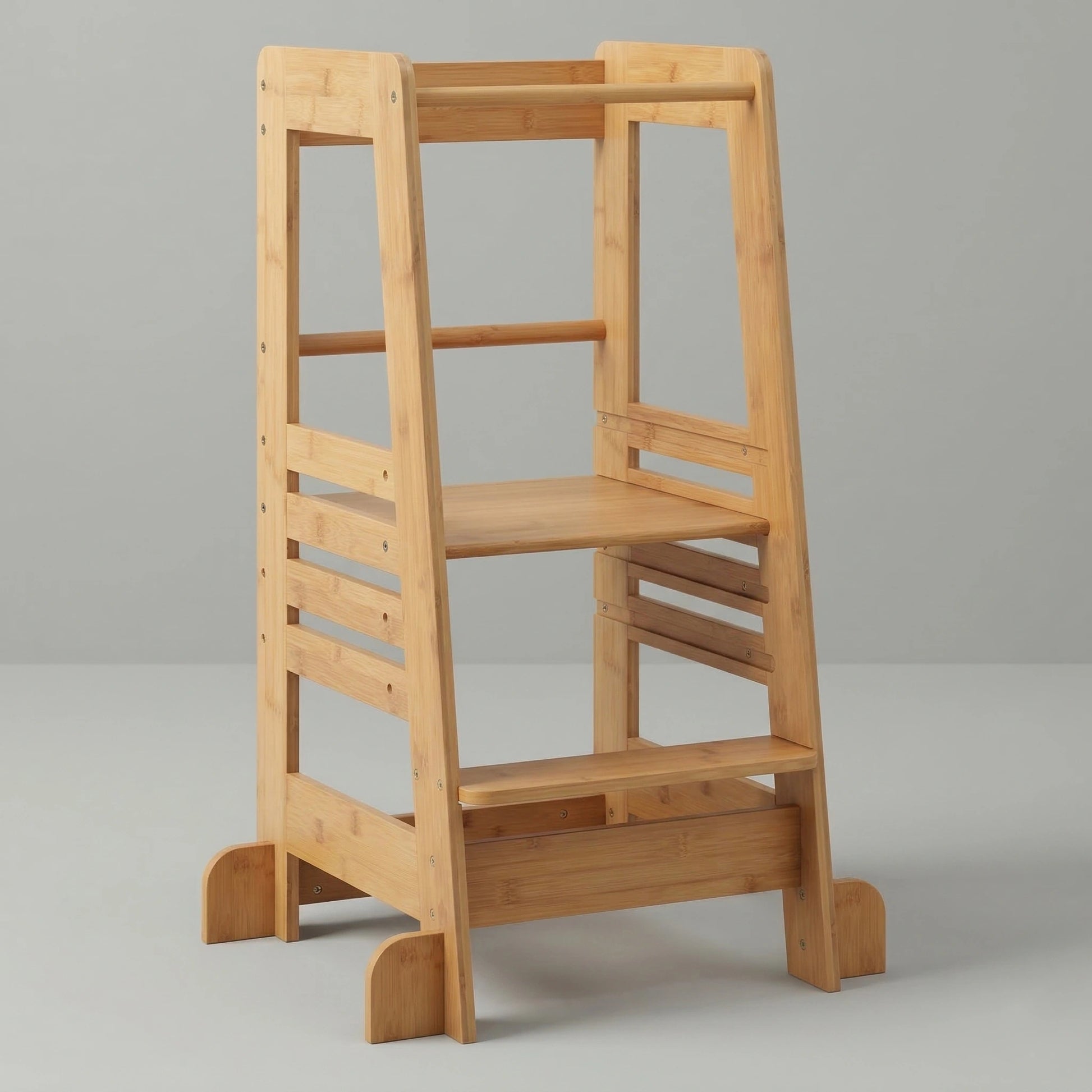 The Hicooo natural bamboo toddler learning tower shown from the front against a light grey background. It features a sturdy wide base, a lower step, an adjustable main platform, and wrap-around safety rails.