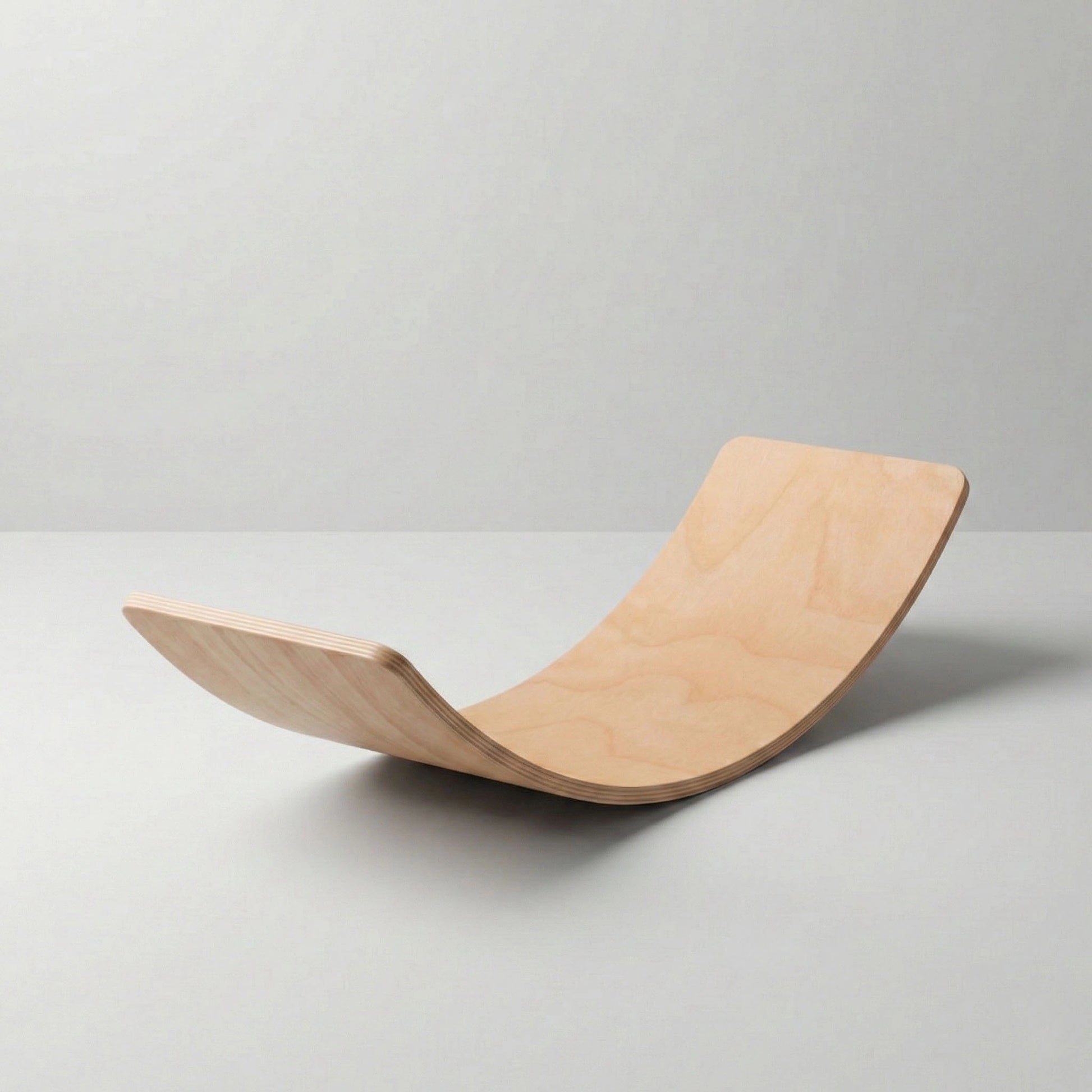 Studio product shot of Hicooo natural wooden curved balance board (also known as a wobble board) against a plain white background. Shows the smooth wood grain finish and the layered plywood construction on the edge.