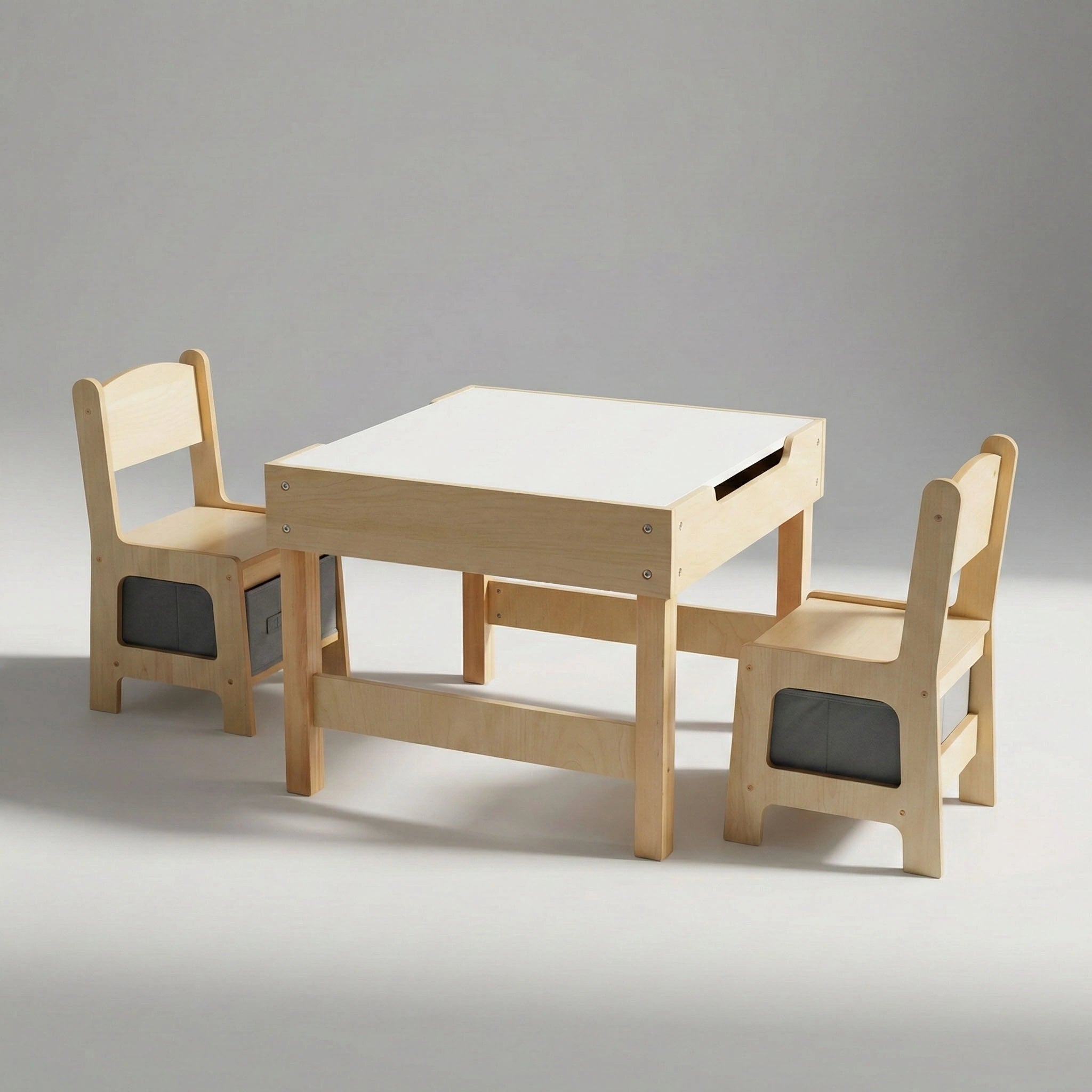 Studio shot of the Hicooo multifunctional kids' table and chair set. Features a natural wood finish, a white activity top, and two chairs with integrated grey fabric storage bins underneath.