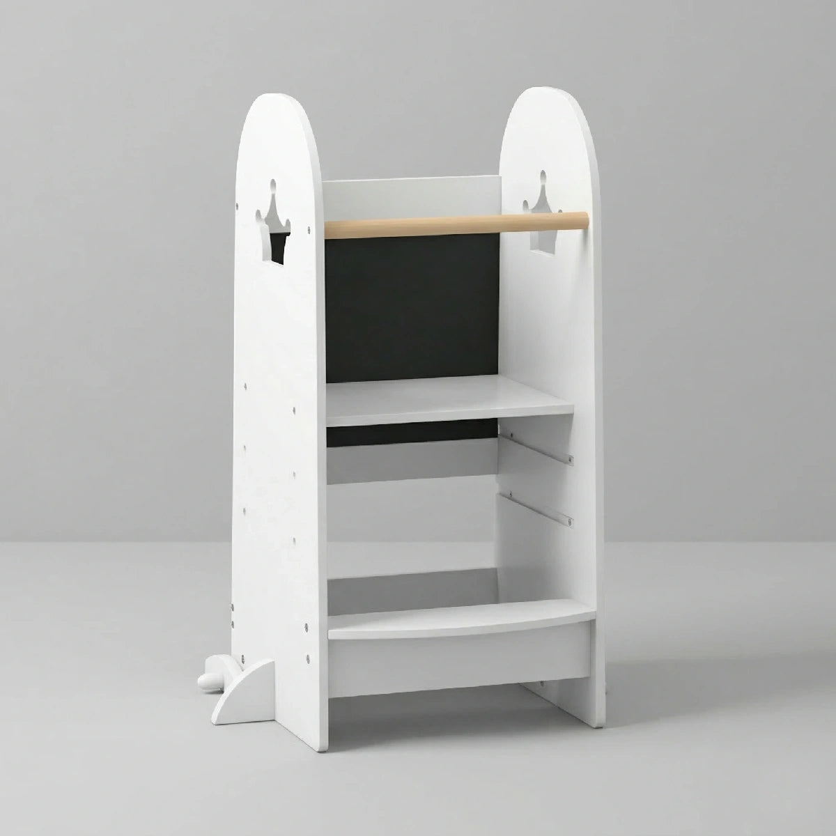 The Hicooo white wooden toddler tower with a crown cutout on the side panels and a wooden safety rail, standing against a light grey background.