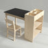 Studio product shot of the Hicooo wooden kids art desk and chair set. Displays the black chalkboard tabletop, sturdy wooden chair, and the empty integrated side storage unit with shelves and compartments.