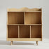 Front view of a solid Hicooo wood kids bookshelf featuring a unique wavy edge design, two shelves with multiple open storage compartments, and raised legs.