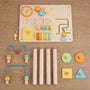 Flat lay view of the hicooo wooden Montessori activity table components. Includes the main activity board with clock and gears, four solid wood legs, two wire bead maze attachments, and geometric shape blocks.