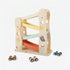 Clean product shot of the HiCOOO Wooden Ramp Racer on a white background, showing three colorful ramp tracks and three mini wooden cars in natural wood, pink and dark tones. FSC certification badge visible, confirming sustainable and eco-friendly materials used in construction