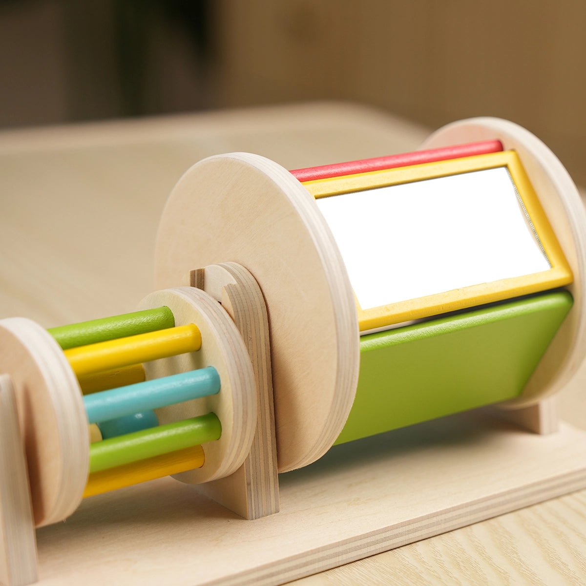 hicooo wooden roller toy - hand demonstrating spinning motion for babies and toddlers