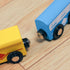 Blue and yellow wooden train cars on track product detail close-up