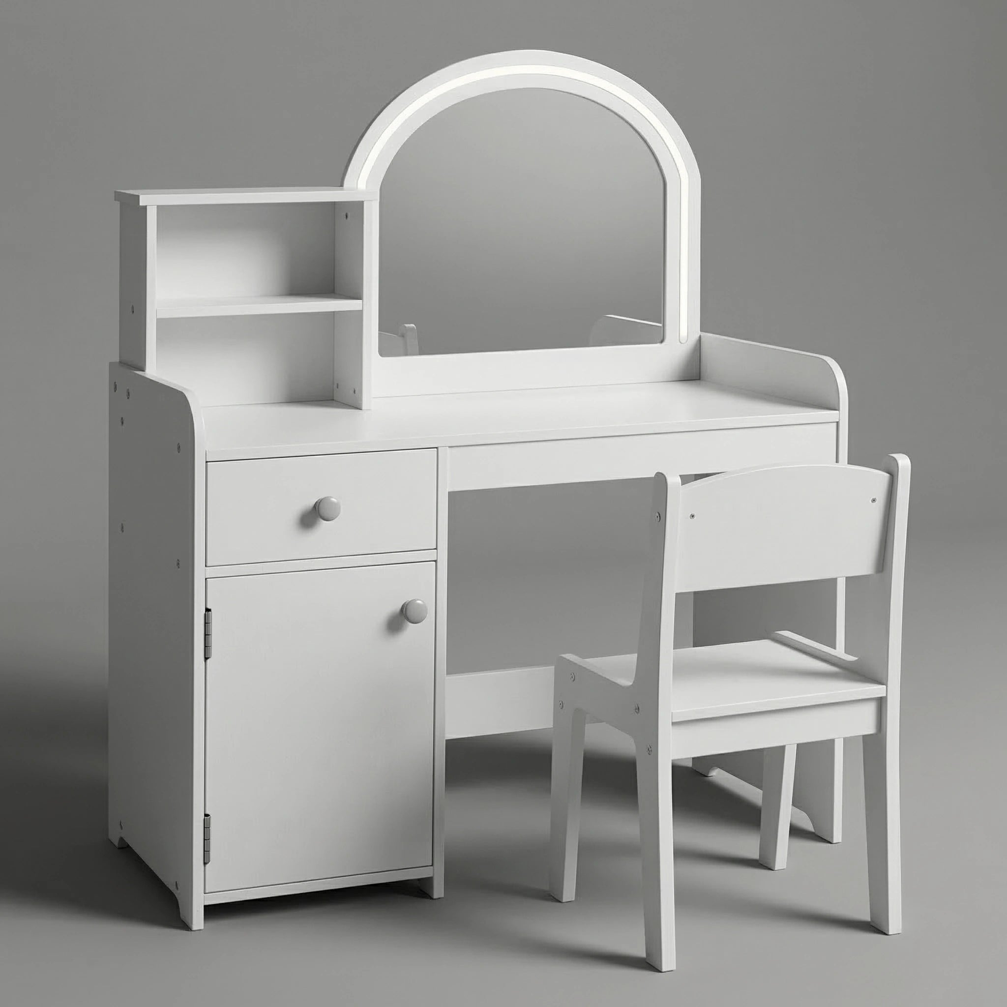 A charming children's bedroom nook featuring a white wooden kids vanity set with a glowing LED-lighted mirror. A comb and brushes sit on the shelves. A matching chair is included. Background includes a woven basket and plants under soft natural light.