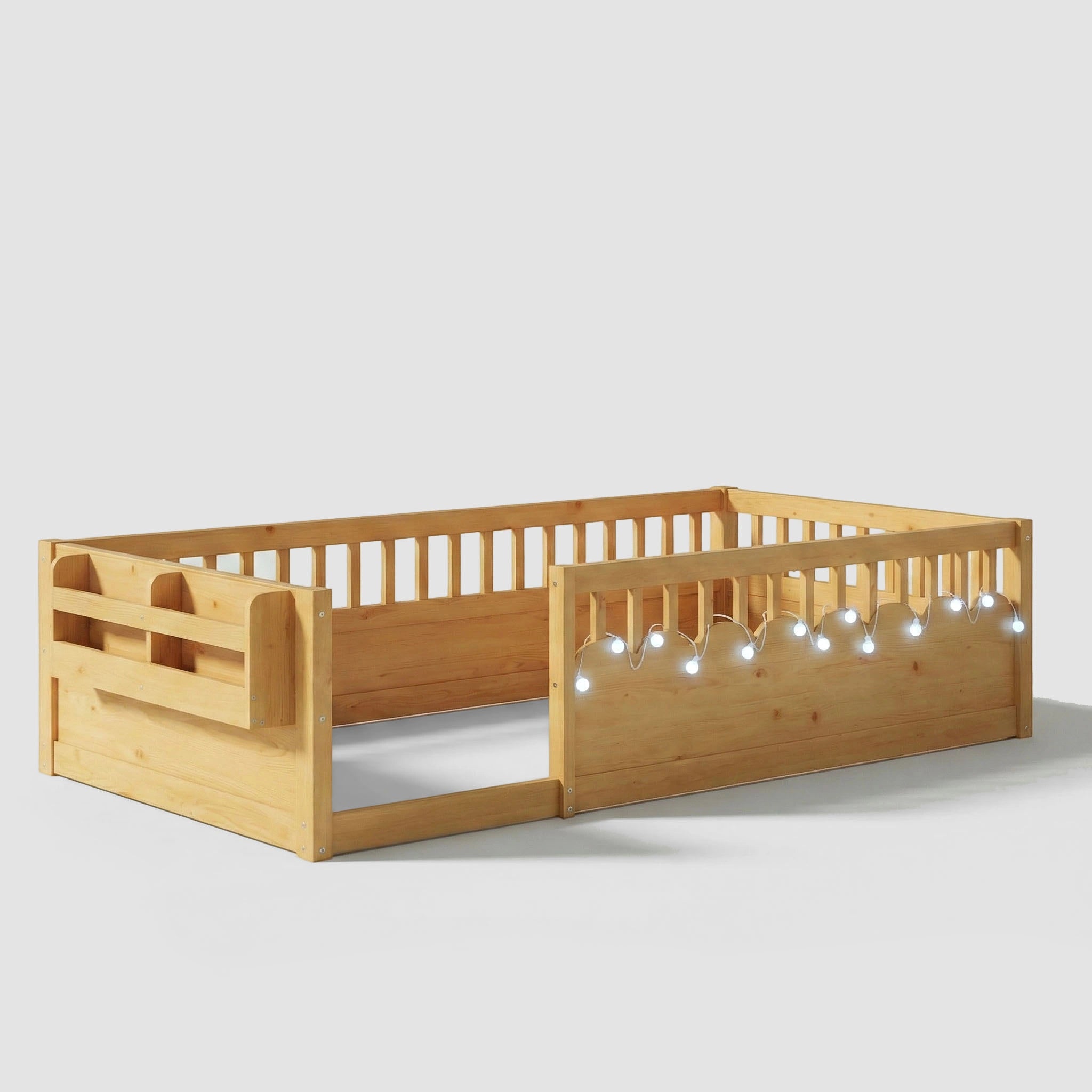Detailed shot of the Hicooo toddler floor bed features. Shows the integrated wooden bookshelf at the end of the bed designed for organizing books and small toys.