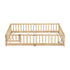 Wooden crib with mattress on a white background