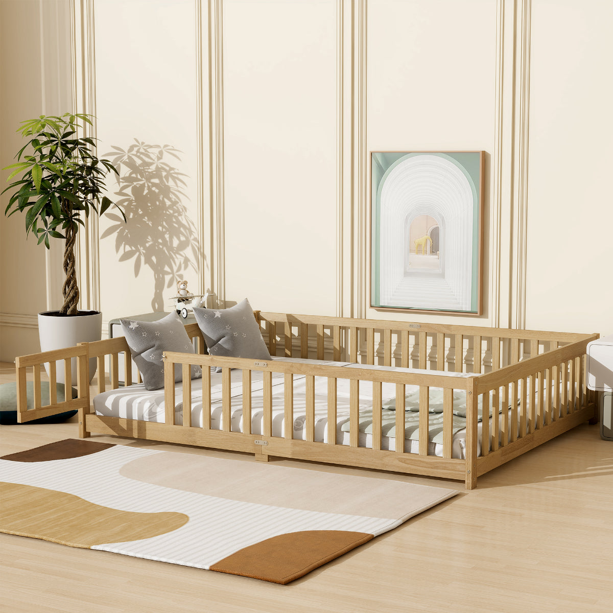 Wooden crib in a room with a plant, rug, and wall art
