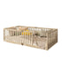 Wooden crib with bedding on a white background