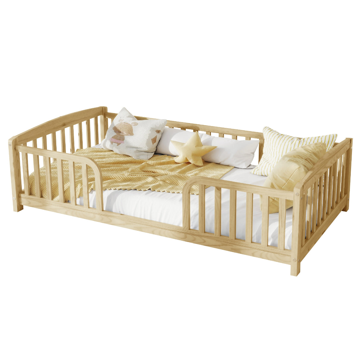 A light natural wood daybed with safety rails, styled with white bedding, a beige patterned blanket, and decorative pillows on a solid white background.