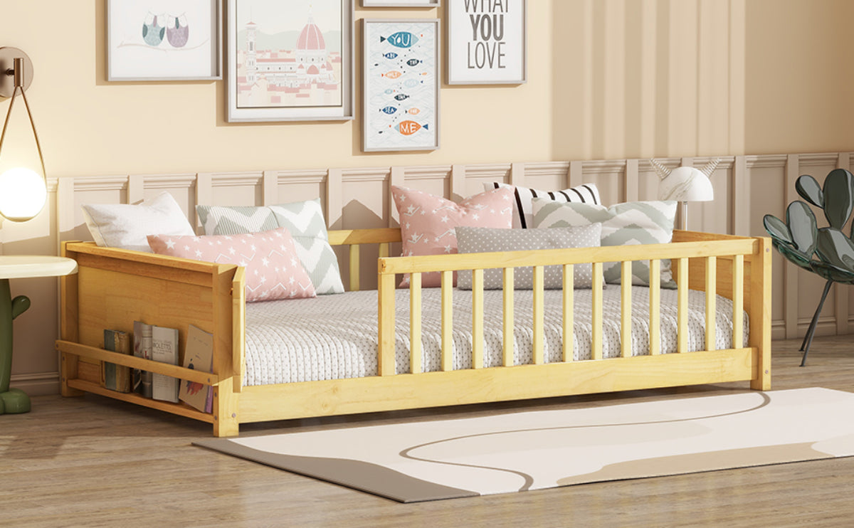 Children's bed with wooden frame and white bedding in a room setting.