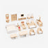 A variety of wooden miniature furniture pieces arranged in a realistic living room and bedroom setup for kids.